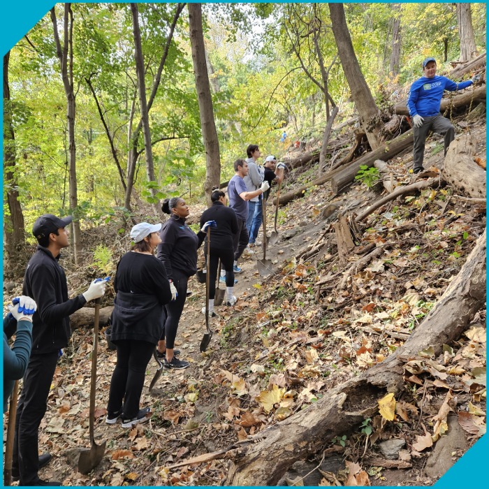 XTX Markets supports charities close to our offices, including volunteering to plant trees in New York City parks.